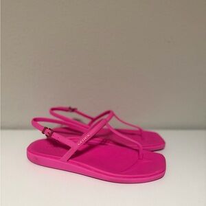 CROCS Fuchsia Flip Flops